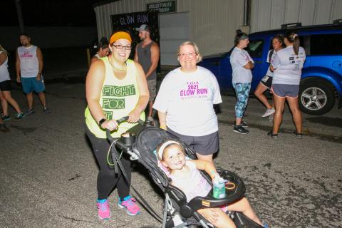Glow run family with stroller